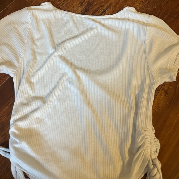 adorable white PacSun crop top. Low cut,can easily be dressed up or dressed down - Picture 2 of 3